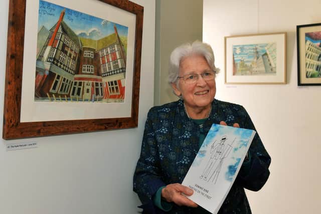 Felicity King the mother of a popular Leeds street painter Dominic King, who died from motor neurone disease at the exhibition of his work being staged at Headingley Enterprise and Arts Centre.

.Picture: Jonathan Gawthorpe
