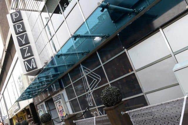 Police are investigating after a man in his 20s was stabbed inside Pryzm nightclub.