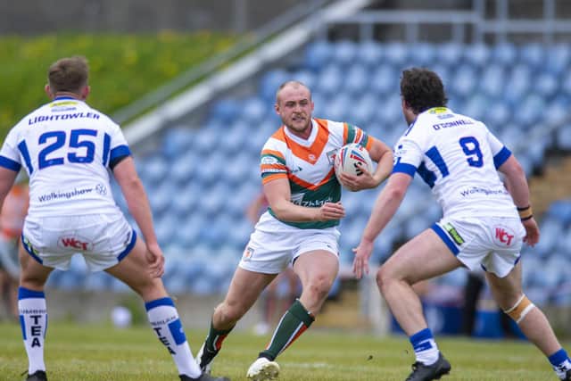 Brad Hey on the attack in Hunslet's home game against Workington. Picture by Tony Johnson.