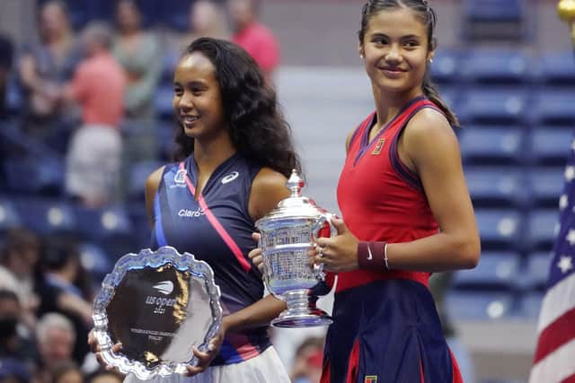 Emma Raducanu, of Britain, right, poses for photos with opponent Leylah Fernandez after winning the US Open women's singles final of in New York Picture: AP/Elise Amendola