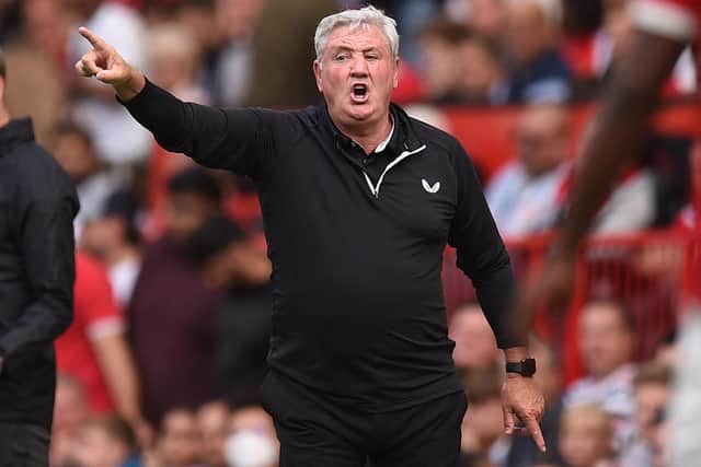 INJURY WOES: For Newcastle United and boss Steve Bruce, above, pictured during Saturday's 4-1 defeat to Manchester United at Old Trafford. Photo by OLI SCARFF/AFP via Getty Images.