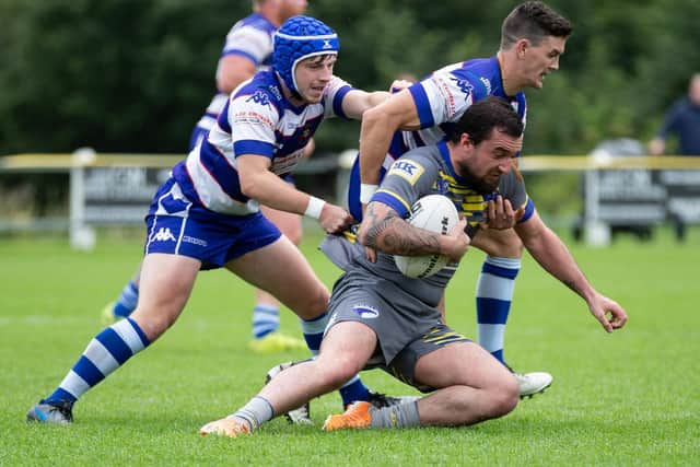 Keiron Walpole, pictured with the ball, kicked two goals for Oulton. Picture by Bruce Fitzgerald.