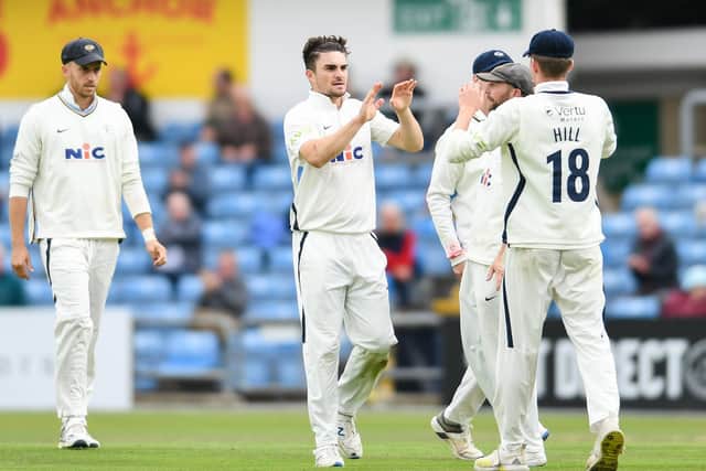 Yorkshire's Jordan Thompson celebrates the wicket of Warwickshire's Dom Sibley with team-mates George Hill and Adam Lyth Picture by Will Palmer/SWpix.com