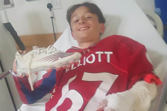 Jacob - a huge Liverpool fan - was taken to hospital after a nasty fall, discovering he had broken his wrist.