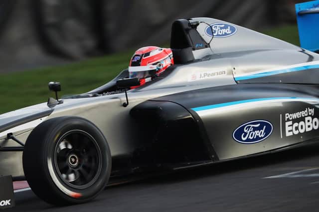 Joel Pearson pictured driving an F4 car