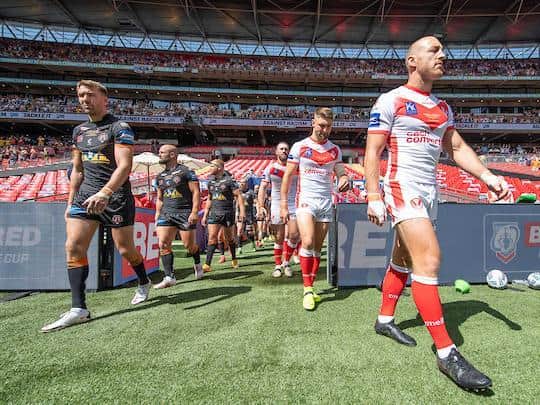 Michael Shenton, left, leads Tigers out at Wembley for this year's Challenge Cup final. Picture by Allan McKenzie/SWpix.com.