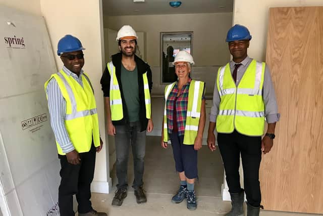 Pictured (left to right) are Cedric Boston, Unity Interim Chief Executive; Yoseph Ahmed, prospective member, ChaCo; Alison Phelps, Neighbourhood Task Group, ChaCo; and Wayne Noteman, Unity Regeneration Director, visiting one of the new Unity flats in Leeds.