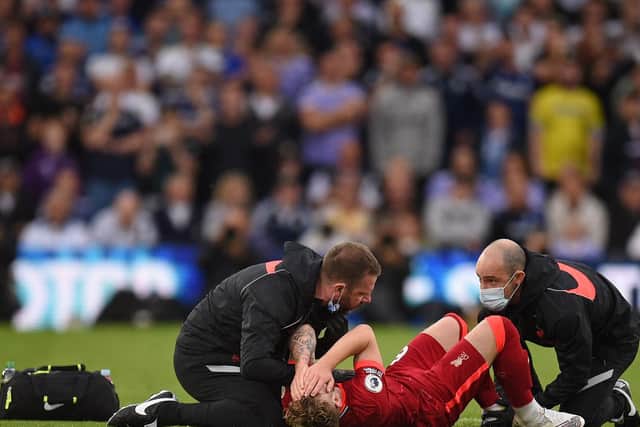 Harvey Elliott is treated for his injury. Pic: Getty