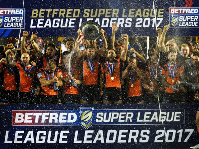 Michael Shenton lifts the Super League leaders' shield in 2017. Picture by Jonathan Gawthorpe.