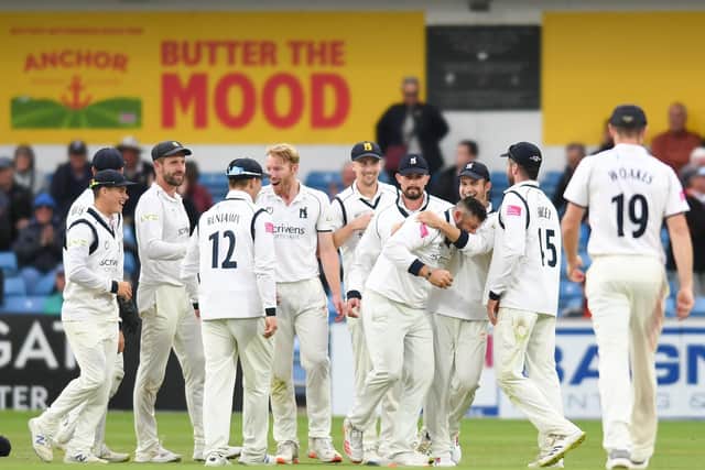 Warwickshire's Tim Bresnan, fourth right, celebrates with team-mates after catching Yorkshire's Dawid Malan out from the final ball of day two at Headingley Picture by Will Palmer/SWpix.com