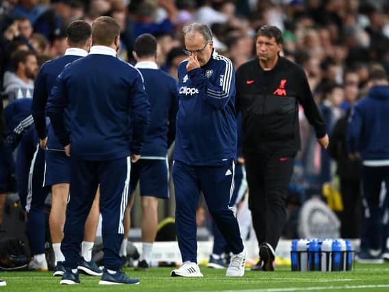 MISSION: Leeds United and head coach Marcelo Bielsa, centre, are still seeking a first win of the new Premier League season following Sunday's 3-0 defeat at home to Liverpool, above. Photo by Shaun Botterill/Getty Images.