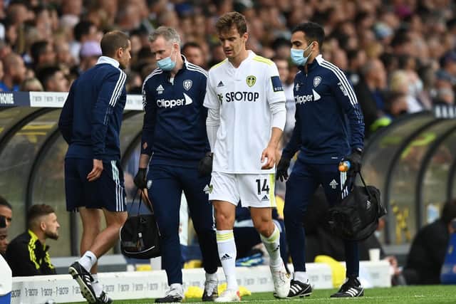 IN GOOD SPIRITS: Leeds United defender Diego Llorente, pictured coming off against Liverpool due to a muscular injury. Photo by Shaun Botterill/Getty Images.