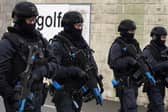 Police Scotland officers take part in a role-play exercise involving an armed policing response stopping a suspect in a vehicle whilst taking part in COP26 public order training at the Scottish Police College Jackton in East Kilbride, ahead of the Cop26 summit in Glasgow. Picture date: Thursday September 9, 2021.
PA