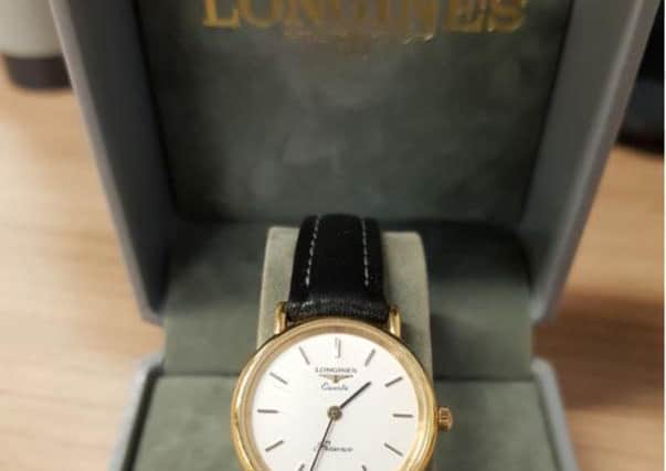 This Longines watch is suspected to have been stolen.