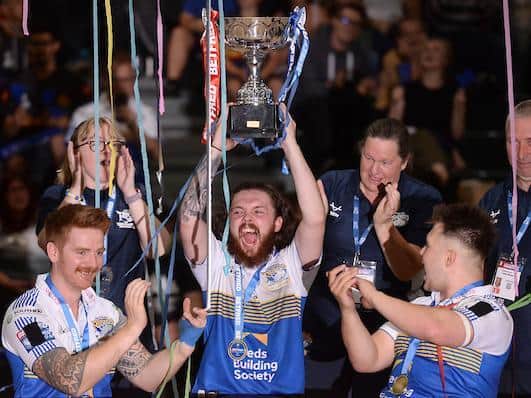 Rhinos celebrate with the Super League trophy. Picture by Richard Blaxall/SWpix.com.