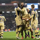 JOB DONE: Leeds United celebrate the late strike from Mirco Antenucci, centre, in the closing stages of a 3-0 victory at Fulham of March 2015. Photo by Jamie McDonald/Getty Images.