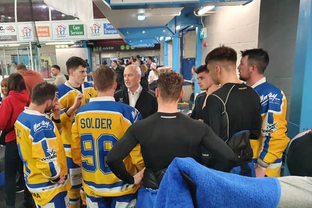 Bobby Streetly, far right, and his fellow Leeds knights' defencemen listen to coach Dave Whistle before face-off at Swindon Wildcats - the team's first-ever game.