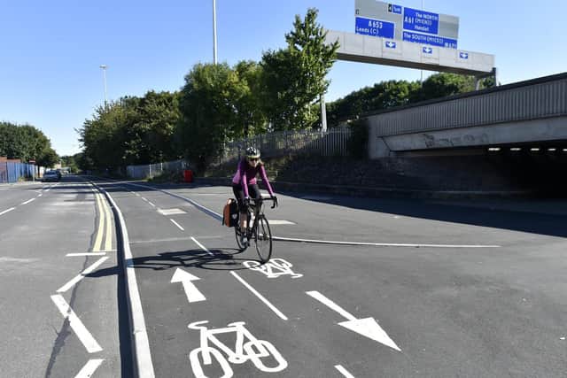 A cyclist using the new cycle lane (photo: Steve Riding).