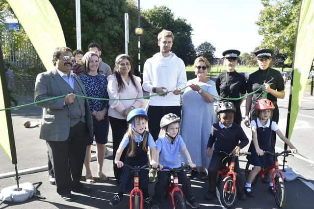 Leeds United's Patrick Bamford officially opens the cycle lane (photo: Steve Riding).