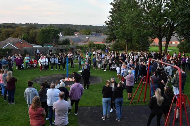 Members of the public light candles as they attend a vigil near to the scene in Chandos Crescent, Killamarsh, near Sheffield, where four people were found dead at a house on Sunday. Picture date: Monday September 20, 2021.
PA