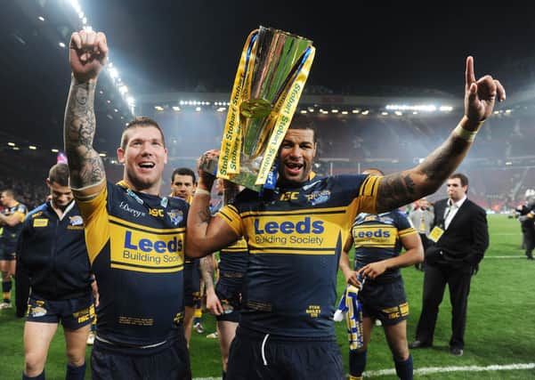 Brett Delaney and Ryan Bailey celebrate Leeds Rhinos' Super League Grand Final triumph over Warrington Wolves in 2012 from a fifth-place finish after the regular season - something they also did in 2011. Picture: Steve Riding.