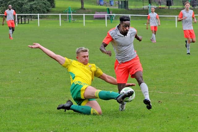Josh Ridsway, of Colton, tackles Chapeltown's Fernando Moke. Picture: Steve Riding.