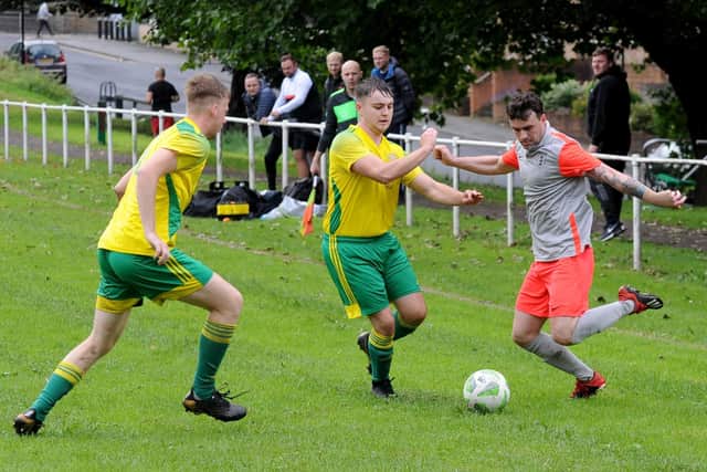 Daniel Leafe, of Chapeltown, looks to cross the ball against Jubilee Premier rivals Colton. Picture: Steve Riding.
