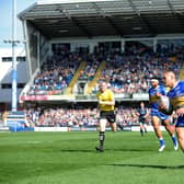 Tui Lolohea scores for Rhinos against Huddersfield in 2019. Picture by Steve Riding.