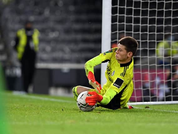 WINNING SAVE - Illan Meslier stopped Rodrigo Muniz' penalty to give Leeds United a 6-5 shootout win in the Carabao Cup at Fulham. Pic: Bruce Rollinson