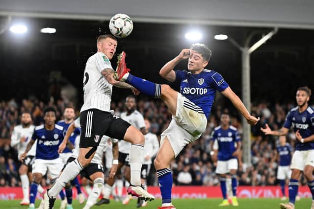 CREATOR: Leeds United winger Dan James, right, helped the Whites carve out plenty of chances in Tuesday night's clash at Fulham, above, but none of them were taken in a goalless draw. Picture by Bruce Rollinson.
