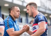RIGHT MAN FOR THE JOB:  Wakefield's interim coach Willie Poching congratulates Joe Arundel after their side's victory over Warrington Wolves Picture by Allan McKenzie/SWpix.com
