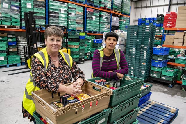 Project manager Wendy Doyle with Nathanya Laurent, foodbank development manager, at the Leeds South and East Foodbank depot on Millshaw Industrial Estate.

 Picture Tony Johnson