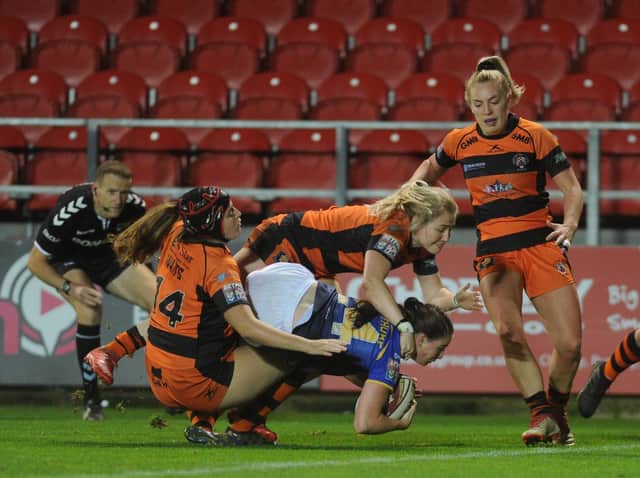 Fran Goldthorp scores for Rhinos in their 2019 Grand Final win over Castleford. Picture by Steve Riding.