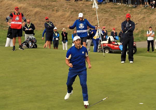 Jon Rahm celebrates winning his singles match against Tiger Woods to help Europe win the 2018 Ryder Cup at Le Golf National in Paris. Picture: Mike Ehrmann/Getty Images