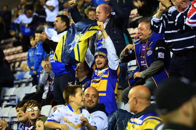 Happy days: Rhinos supporters celebrate their play-off win over Wigan. Picture: Jonathan Gawthorpe