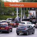 Queues outside Sainsbury's Petrol Station in Colton (photo: PA).