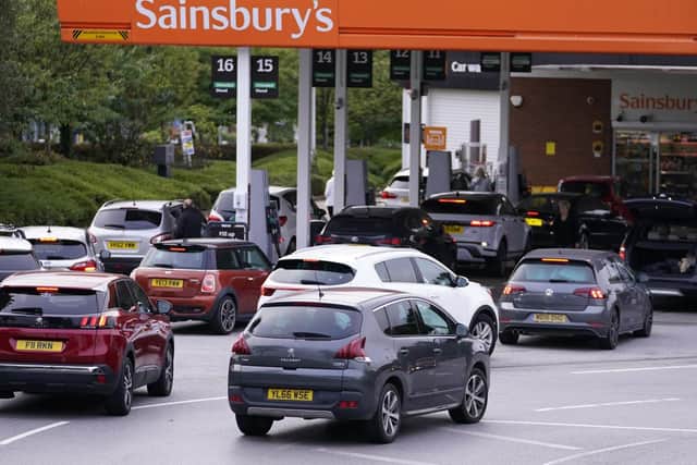 Queues outside Sainsbury's Petrol Station in Colton (photo: PA).