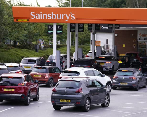 Queues outside Sainsbury's Petrol Station in Colton (photo: PA).