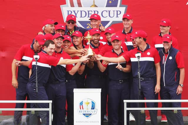 Team United States celebrates with the Ryder Cup after defeating Team Europe 19 to 9. (Photo by Stacy Revere/Getty Images)