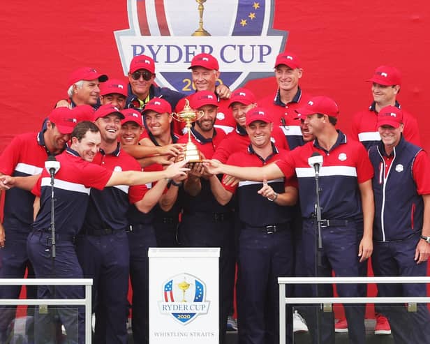 Team United States celebrates with the Ryder Cup after defeating Team Europe 19 to 9. (Photo by Stacy Revere/Getty Images)