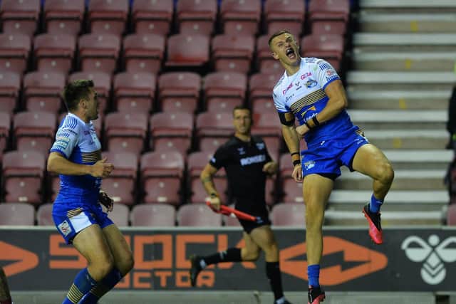 Ash Handley jumps for joy after scoring against Wigan. Picture by Jonathan Gawthorpe.