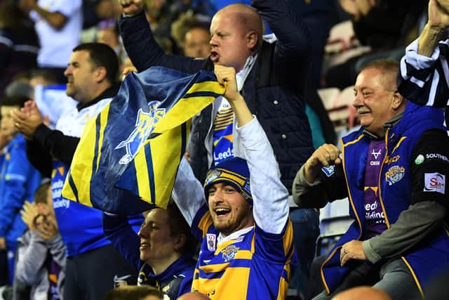 Rhinos' travelling fans enjoyed the win at DW Stadium. Picture by Jonathan Gawthorpe.