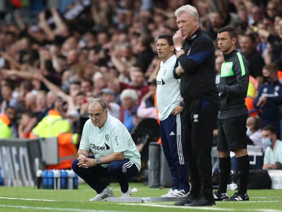 THE WAIT GOES ON: For Leeds United and head coach Marcelo Bielsa, left, who are still seeking a first win of the new Premier League season after Saturday's 2-1 defeat at home to West Ham, above. Photo by George Wood/Getty Images.