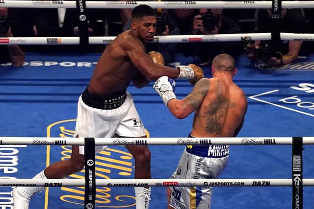 Anthony Joshua in action against Oleksandr Usyk in the WBA, WBO, IBF and IBO World Heavyweight titles match at the Tottenham Hotspur Stadium. Picture: Nick Potts/PA