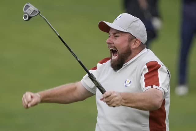 GET IN: Team Europe's Shane Lowry celebrates on the 18th hole after making a putt and to win his four-ball match the Ryder Cup at the Whistling Straits. picture: AP/Charlie Neibergall