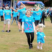 Amy Allan and daughter Arabella, 20 months who were walking for grandmother and great grand mother Christine Bottom