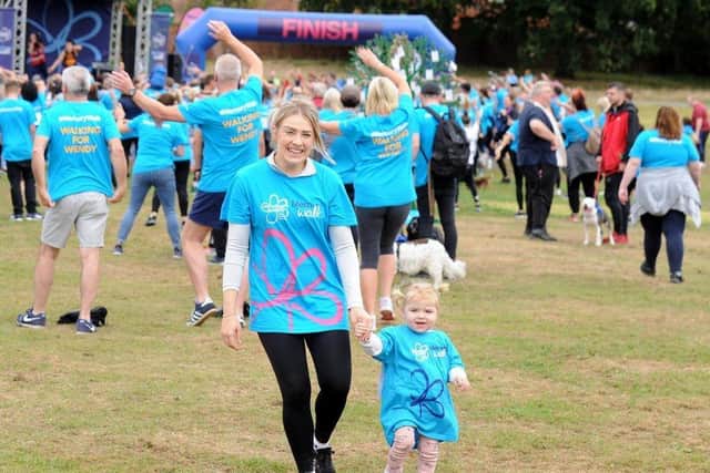Amy Allan and daughter Arabella, 20 months who were walking for grandmother and great grand mother Christine Bottom