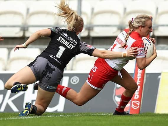 Tara Jane Stanley can't prevent Jodie Cunningham scoring for Saints. Picture by Paul Currie/SWpix.com.