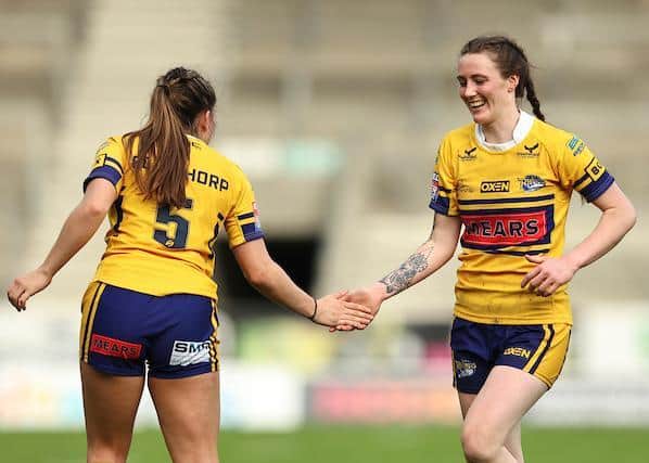 Two-try star Sophie Nuttall, right, celebrates with Fran Goldthorp during Rhinos' semi-final win over York. Picture by Paul Currie/SWpix.com.