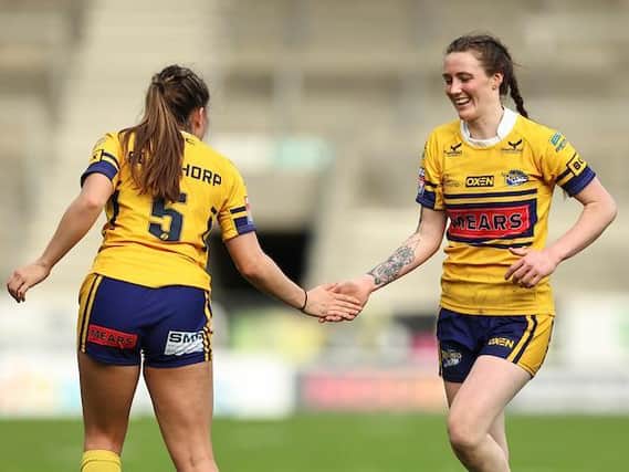 Two-try star Sophie Nuttall, right, celebrates with Fran Goldthorp during Rhinos' semi-final win over York. Picture by Paul Currie/SWpix.com.